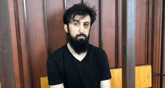 Кемал Тамбиев со следами избиения на лице